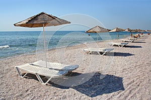 Sun loungers on beach