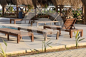 sun loungers near the cafe and pool in a residential complex 2