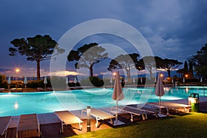 Sun loungers on poolside