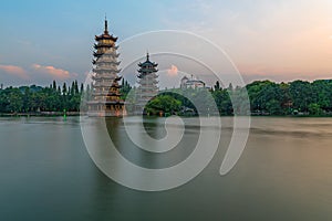 Sun and moon pagodas in Guilin at dusk