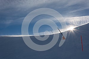 Sun over a slope in the Autrian mountains