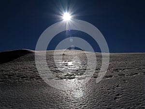 Sun over the snow