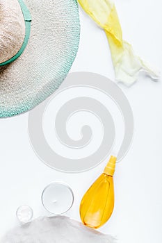 Sun protection concept with cream and lotion white background top view mockup
