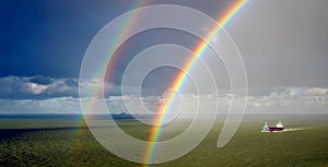 Sun, rain and a double rainbow.