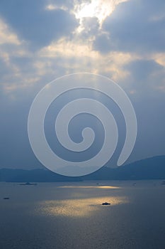 Sun ray over Sun Moon Lake, view from Wen Wu Temple