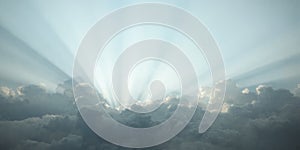 Sun rays breaking through a cloudy sky