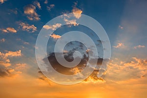 Sun Rays and Colorful Clouds in Blue Sky at Sunset for Background