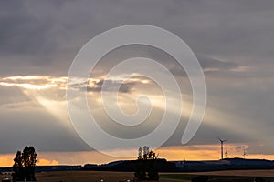 Sun rays shining through clouds