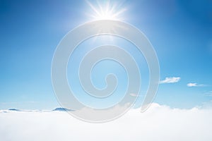 Sun rays shinning in the blue sky