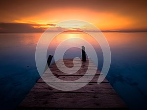 Sunbeams at sunset on the beach of Maratua Island, Borneo, Indonesia.jpg