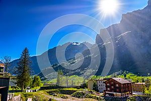 Sun rays in Swiss Village in Alp mountains, Leukerbad, Leuk, Vis