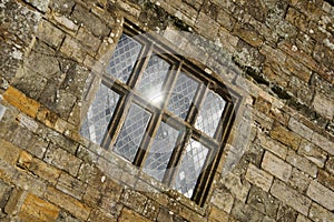 Sun reflected in Battle Abbey leaded window