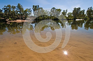 Sun reflected in pool, Manning Gorge, Australia