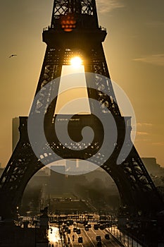 Sun rises in the Eiffel Tower