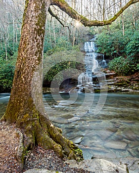 Sun Rises Over Water Fall