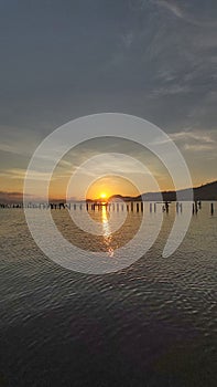 Sun Rising at Labuhan Trata Sumbawa Island, Western Nusa Tenggara, Indonesia photo
