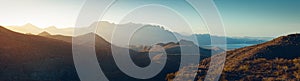 Sun rising over mountains and a bay near Loreto, Mexico