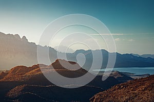 Sun rising over mountains and a bay near Loreto, Mexico