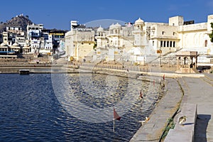 The sun rising over the sacred lake of pushkar