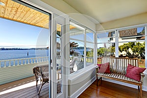 Sun room and walkout deck. American architecture. Real estate wi