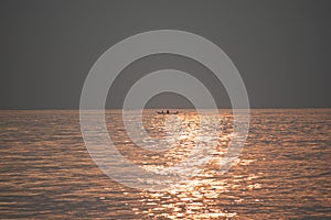 The sun`s rays appear transparent in the sea water