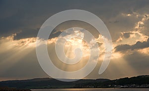 Sun's rays over Black Isle and Beauly Firth. photo