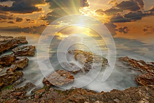 The sun's rays passing through the clouds