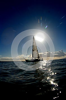 The sun and a sailboat