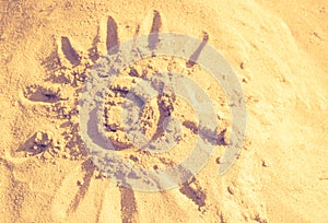 Sun, sand, warm, abstract background. Summer, the sun drawn in t