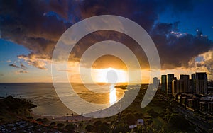 Sun set over skyline of Honolulu