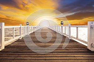 Sun set scene and old wood bridge pier with nobody against beaut