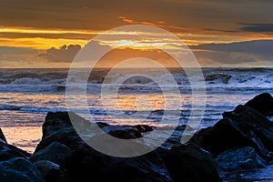 Sun set sky at hokitika beach west coast south island new zealand