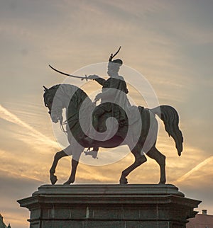 The sun sets behind Tomislav`s statue