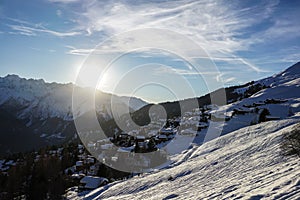 The sun sets over verbier in winter