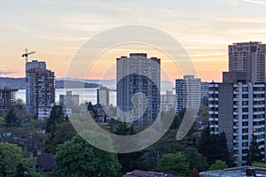 The sun sets in pink over Vancouver