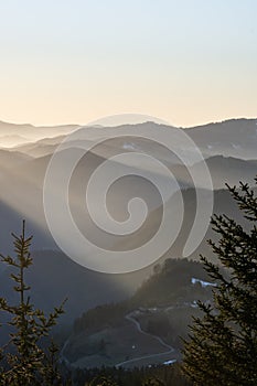 the sun is setting in Austrias lower alps