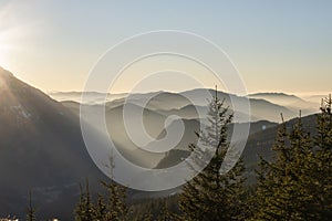 the sun is setting in Austrias lower alps