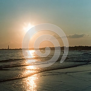 Sun setting on Cape May beach