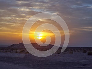 Sun setting in the desert