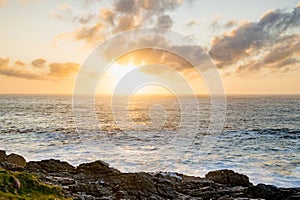 Sun setting at Malin Head, Ireland\'s northernmost point, Wild Atlantic Way, spectacular coastal route.