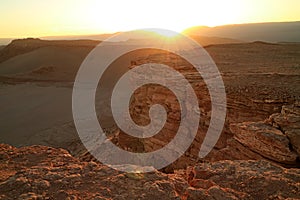 The Sun Setting on the Mountain Ranges of Valle de la Luna or Moon Valley in Atacama Desert, San Pedro de Atacama, Northern Chile