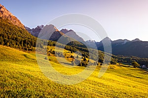 Sun is setting at the mountains surrounding TaraspGraubÃ¼nden, Switzerland