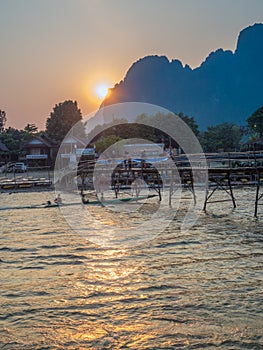 Sun setting on Nam Song River, Laos