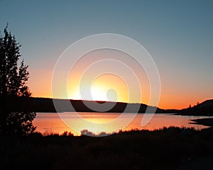 Sun setting over Big Bear Lake California