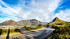 Sun setting over Cape Town, Table Mountain, Devils Peak, Lions Head and the Twelve Apostles