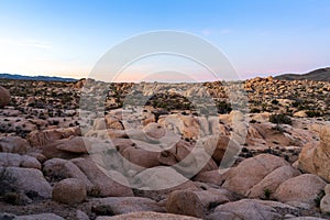 Sun Setting Over Large Boulders