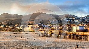 Sun setting on Pismo beach pier