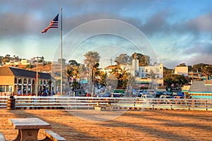 sun setting on Pismo beach pier