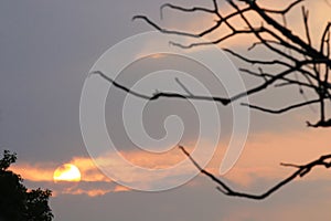 The sun is setting slowly in winter