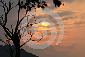 The sun is setting slowly in winter